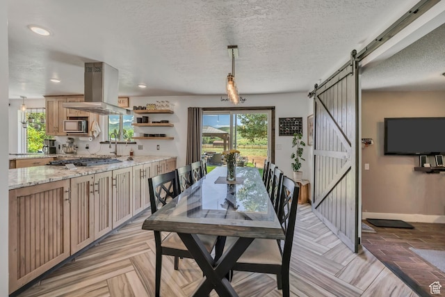 8695 E 800 S, Huntsville, UT 84317 - dining space with a barn door, plenty of natural light, a textured ceiling, and recessed lighting