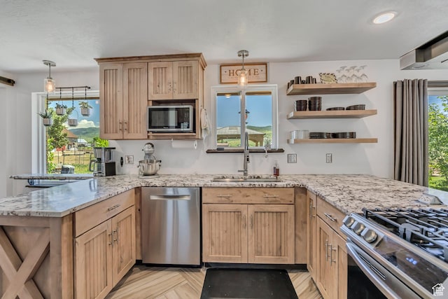 8695 E 800 S, Huntsville, UT 84317 - kitchen with stainless steel appliances, a peninsula, decorative light fixtures, light stone countertops, and recessed lighting