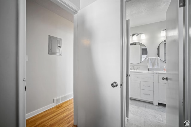 733 W 3500 S, Bountiful, UT 84010 - corridor with electric panel and baseboards