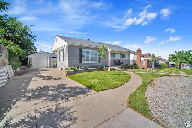 733 W 3500 S, Bountiful, UT 84010 - view of front of property with an outdoor structure, a garage, and a front yard