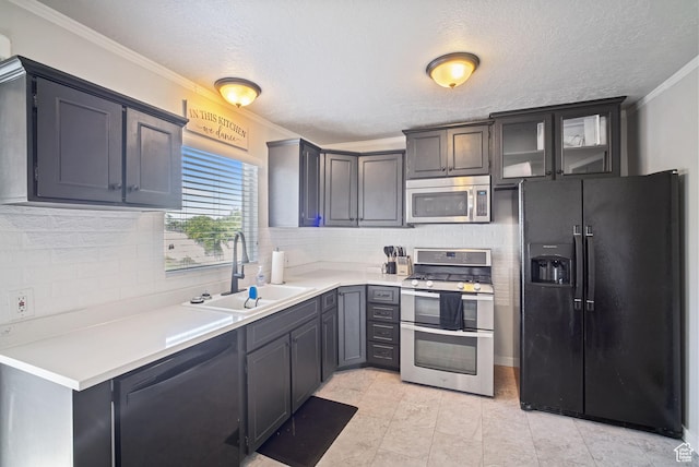 733 W 3500 S, Bountiful, UT 84010 - kitchen with appliances with stainless steel finishes, crown molding, decorative backsplash, light countertops, and glass insert cabinets