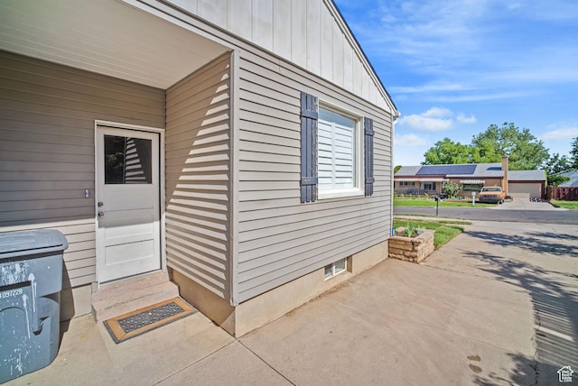733 W 3500 S, Bountiful, UT 84010 - view of exterior entry featuring board and batten siding