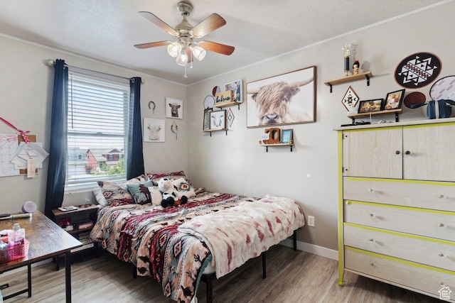 2536 S Andover St, West Haven, UT 84401 - bedroom with wood finished floors, ornamental molding, and ceiling fan