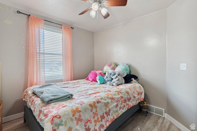 2536 S Andover St, West Haven, UT 84401 - bedroom with wood finished floors and a ceiling fan