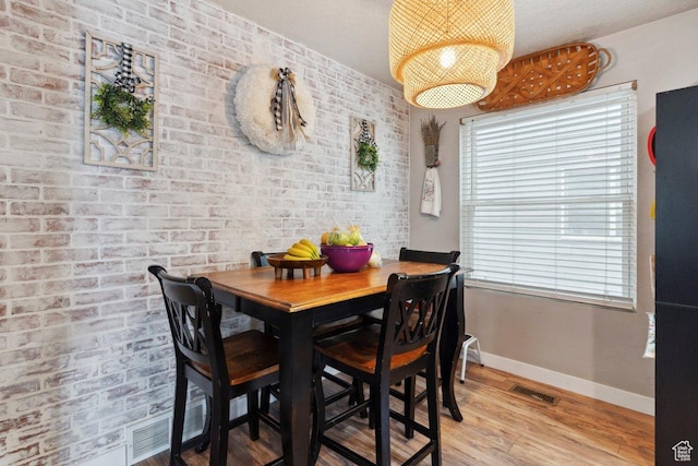 2536 S Andover St, West Haven, UT 84401 - dining space with baseboards and light wood finished floors
