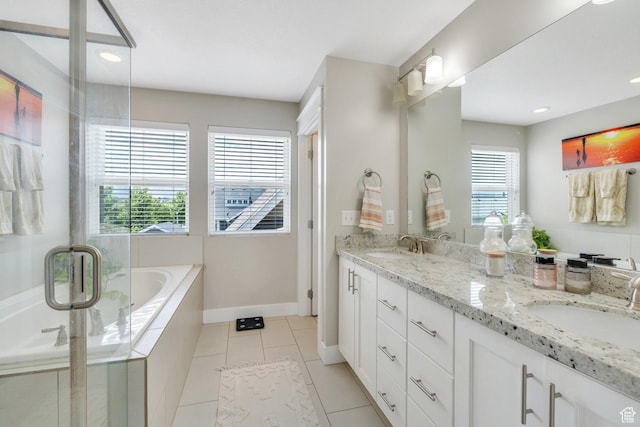 10616 S Wistful Way S, Jordan, UT 84009 - bathroom with double vanity, a bath, tile patterned floors, a stall shower, and recessed lighting