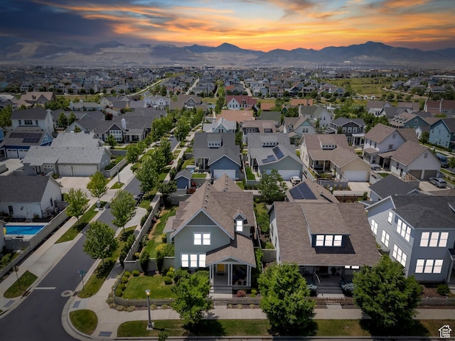 10616 S Wistful Way S, Jordan, UT 84009 - aerial view at dusk of a mountain view and a residential view