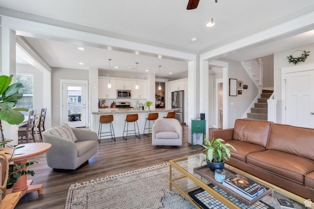 10616 S Wistful Way S, Jordan, UT 84009 - living area featuring wood finished floors, stairway, recessed lighting, and ceiling fan