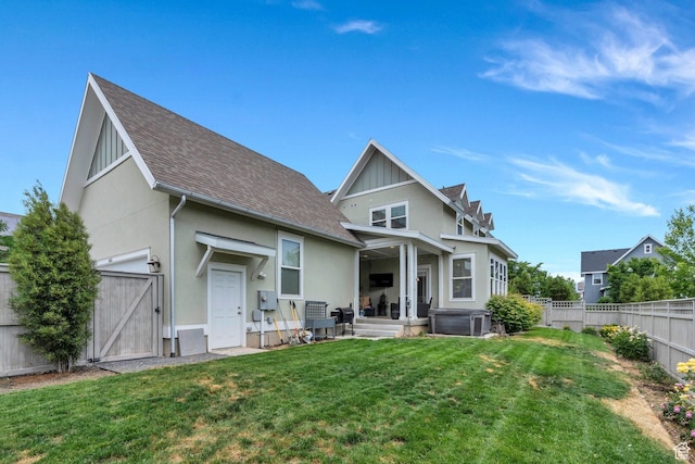 10616 S Wistful Way S, Jordan, UT 84009 - rear view of property featuring a fenced backyard, a gate, roof with shingles, and stucco siding