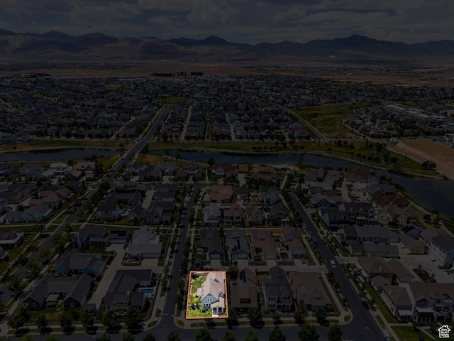 10616 S Wistful Way S, Jordan, UT 84009 - aerial view of residential area featuring property boundaries highlighted and a water and mountain view