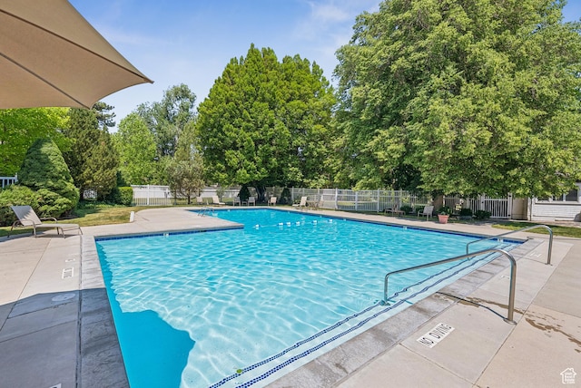 4178 S 650 E, Murray, UT 84107 - community pool with a patio and view of wooded area