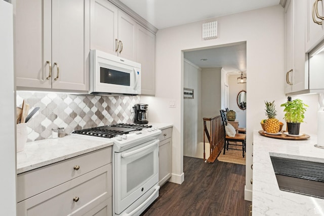 4178 S 650 E, Murray, UT 84107 - kitchen with white appliances, backsplash, dark wood finished floors, light stone counters, and white cabinets