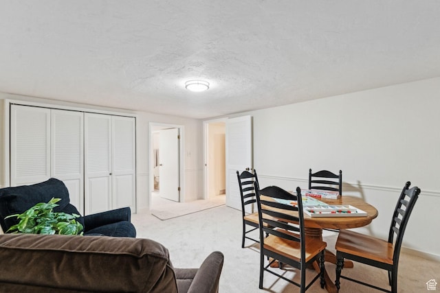 4178 S 650 E, Murray, UT 84107 - dining area featuring light carpet and a textured ceiling