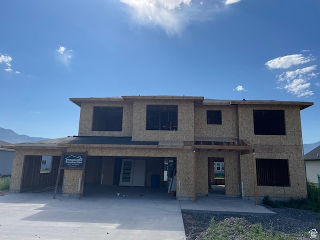 1858 N 515 W, Logan, UT 84341 - view of front of home with concrete driveway and a carport