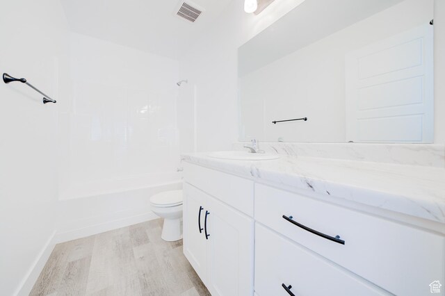 1858 N 515 W, Logan, UT 84341 - full bathroom featuring vanity, wood finished floors, and bathtub / shower combination