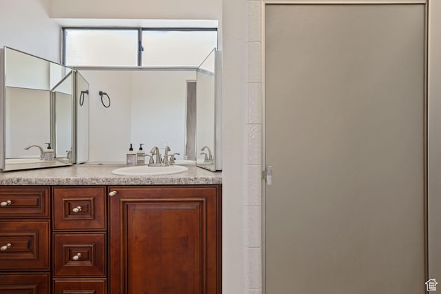2402 S Elizabeth St Unit 5, Salt Lake City, UT 84106 - full bathroom featuring double vanity and a shower