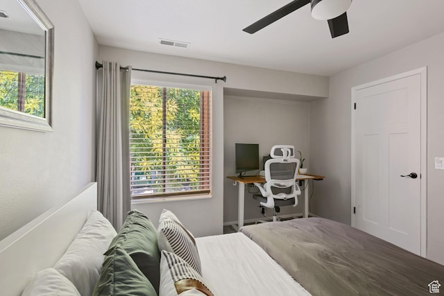 2402 S Elizabeth St Unit 5, Salt Lake City, UT 84106 - bedroom featuring multiple windows and a ceiling fan
