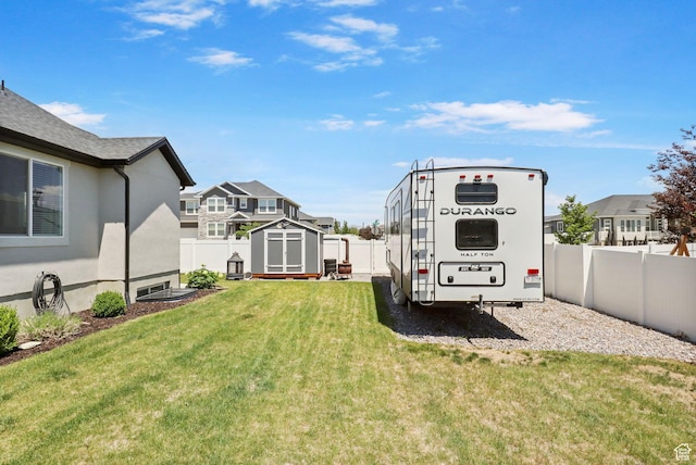 4764 N Gunsight Peak Dr, Eagle Mountain, UT 84005 - fenced backyard with a storage shed