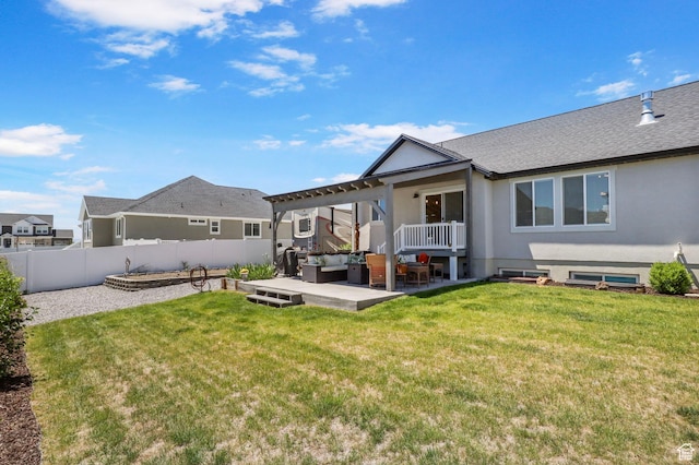 4764 N Gunsight Peak Dr, Eagle Mountain, UT 84005 - back of property featuring an outdoor hangout area, a fenced backyard, a patio area, stucco siding, and roof with shingles