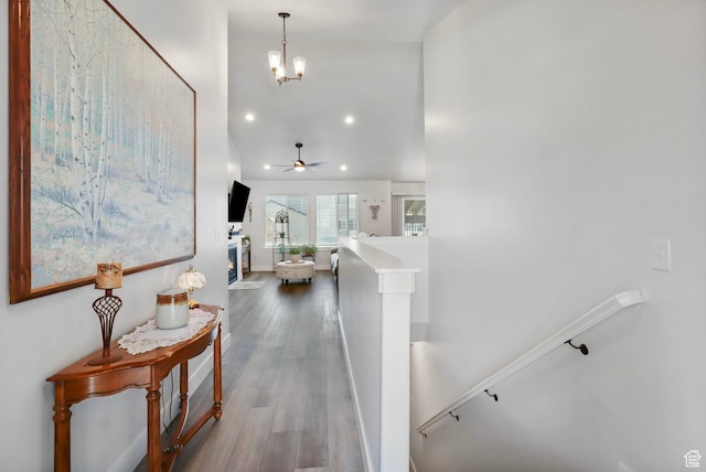 4764 N Gunsight Peak Dr, Eagle Mountain, UT 84005 - hallway featuring recessed lighting, an upstairs landing, wood finished floors, and a chandelier