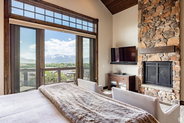 285 N Kings Peak Ct, Heber City, UT 84032 - bedroom with lofted ceiling, access to outside, wood ceiling, and a fireplace