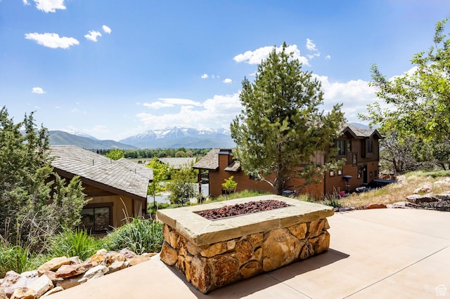 285 N Kings Peak Ct, Heber City, UT 84032 - view of patio / terrace featuring an outdoor fire pit and a mountain view
