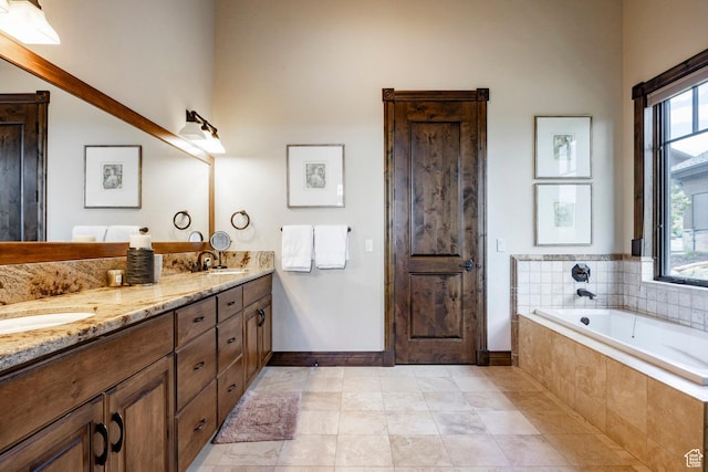 285 N Kings Peak Ct, Heber City, UT 84032 - bathroom with double vanity, a garden tub, and tile patterned floors