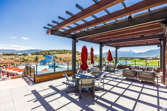 285 N Kings Peak Ct, Heber City, UT 84032 - view of patio / terrace featuring a mountain view, outdoor dining area, a pergola, and an outdoor living space