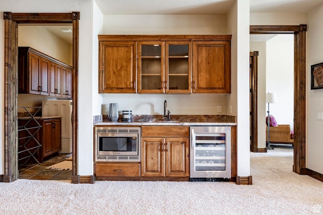 285 N Kings Peak Ct, Heber City, UT 84032 - indoor wet bar with beverage cooler, stainless steel microwave, and dark colored carpet