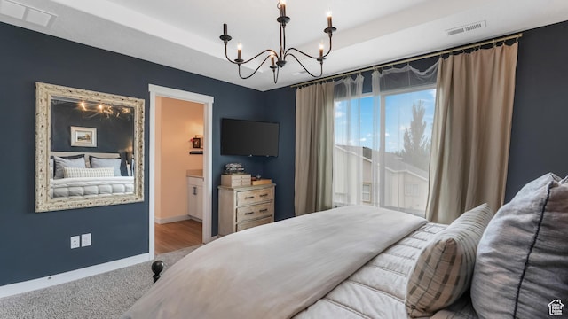 748 S Crooked Post Way, Saratoga Springs, UT 84045 - bedroom with a chandelier, a raised ceiling, and carpet flooring