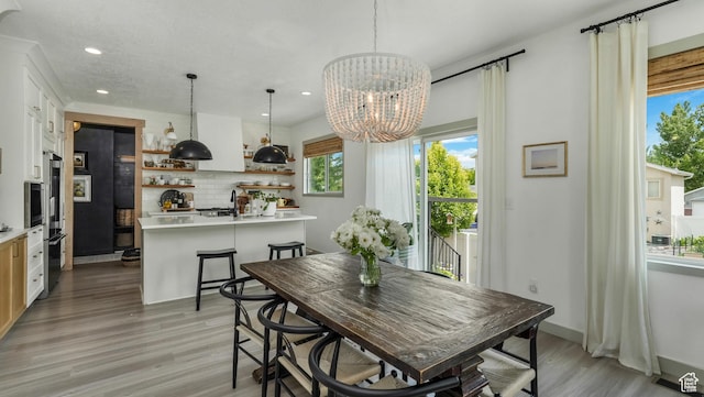 748 S Crooked Post Way, Saratoga Springs, UT 84045 - dining area featuring recessed lighting, light wood-style floors, and a chandelier
