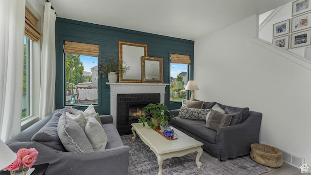 748 S Crooked Post Way, Saratoga Springs, UT 84045 - living room with a glass covered fireplace and wood finished floors