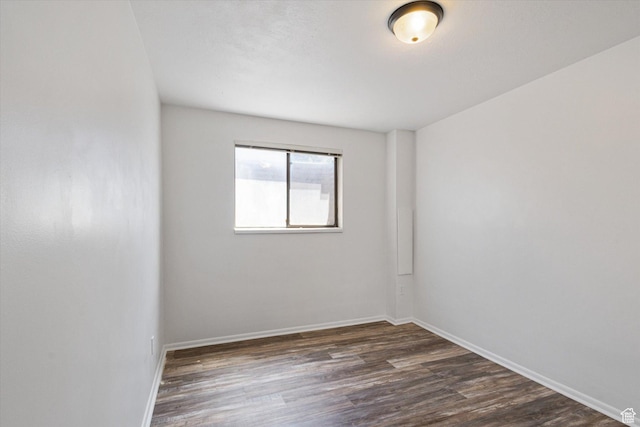 3195 E Willowcrest S, Cottonwood Heights, UT 84121 - spare room with dark wood-style floors and baseboards