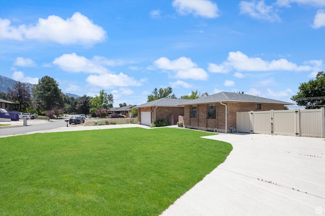 3195 E Willowcrest S, Cottonwood Heights, UT 84121 - ranch-style house with a gate, concrete driveway, a garage, and brick siding