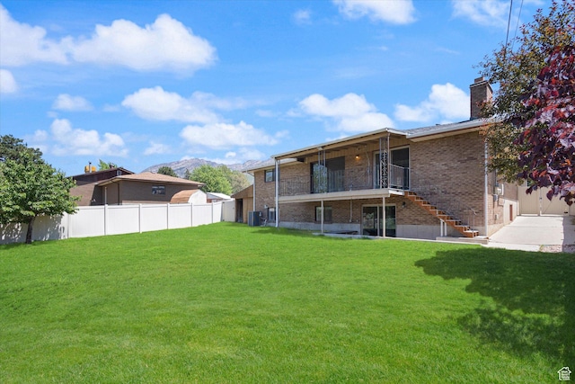 3195 E Willowcrest S, Cottonwood Heights, UT 84121 - view of yard featuring stairway, a mountain view, and a patio area