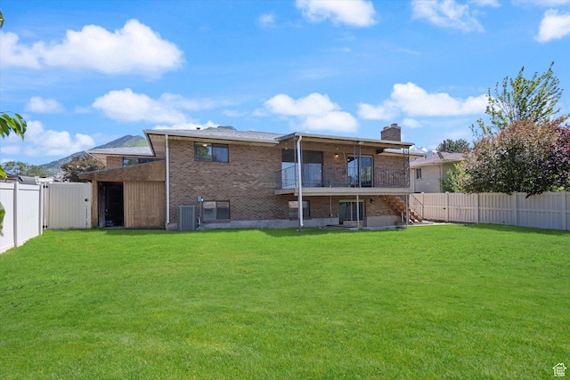 3195 E Willowcrest S, Cottonwood Heights, UT 84121 - rear view of property with brick siding, a fenced backyard, a chimney, and stairs