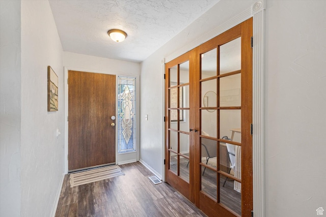 3195 E Willowcrest S, Cottonwood Heights, UT 84121 - foyer featuring french doors, wood finished floors, and a textured ceiling