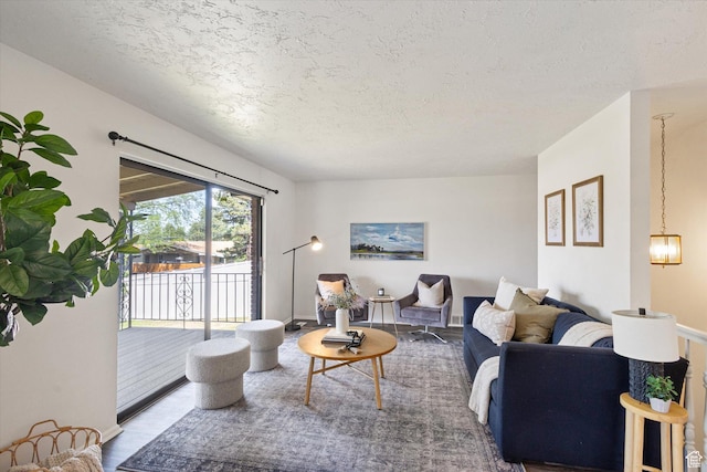 3195 E Willowcrest S, Cottonwood Heights, UT 84121 - living area with a textured ceiling and wood finished floors