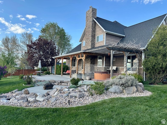 840 S Williams Cv W, Salem, UT 84653 - rear view of property featuring a fire pit, a patio, a chimney, roof with shingles, and stone siding