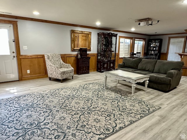 840 S Williams Cv W, Salem, UT 84653 - living area with light wood-type flooring, crown molding, a wainscoted wall, and recessed lighting