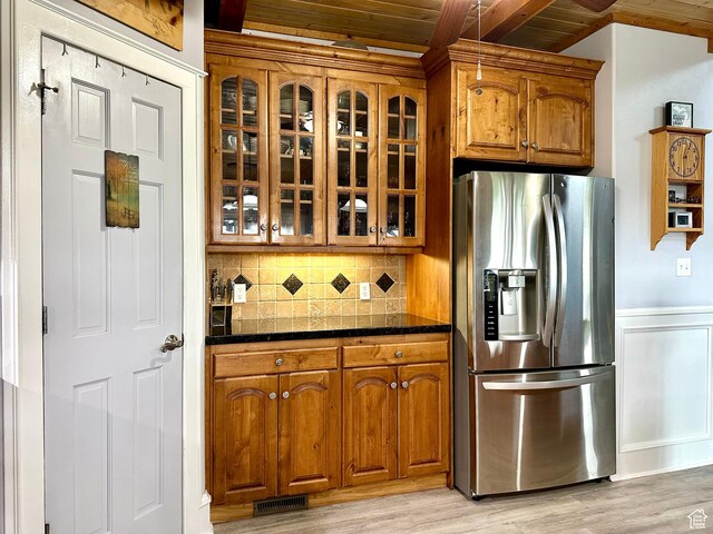 840 S Williams Cv W, Salem, UT 84653 - kitchen with stainless steel refrigerator with ice dispenser, wooden ceiling, glass insert cabinets, brown cabinetry, and decorative backsplash