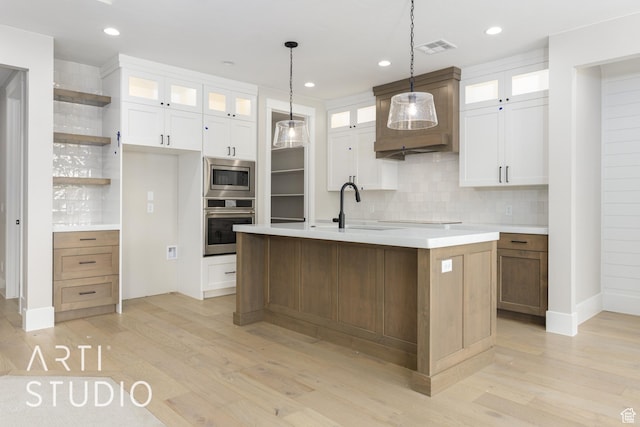 2818 E Rill Dr, Washington, UT 84780 - kitchen with stainless steel appliances, open shelves, decorative backsplash, light wood finished floors, and recessed lighting