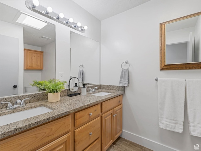 8359 S Fayeway Dr, Sandy, UT 84094 - full bath featuring double vanity and wood finished floors