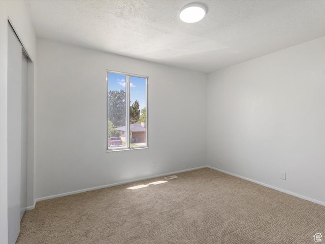 8359 S Fayeway Dr, Sandy, UT 84094 - unfurnished room with carpet flooring and a textured ceiling