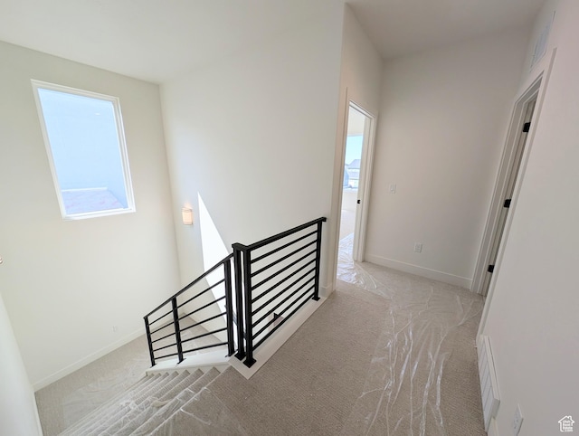 7071 W Granbury Dr S Unit 258, South Jordan, UT 84009 - corridor with an upstairs landing and carpet flooring