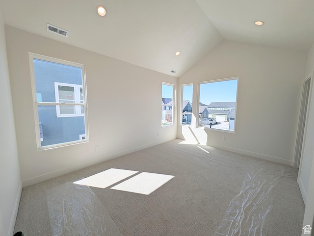 7071 W Granbury Dr S Unit 258, South Jordan, UT 84009 - carpeted empty room featuring lofted ceiling and recessed lighting