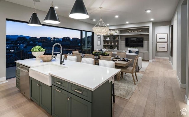 4578 N Solstice Dr Unit 332, Lehi, UT 84043 - kitchen featuring stainless steel dishwasher, light wood-type flooring, open floor plan, light countertops, and recessed lighting