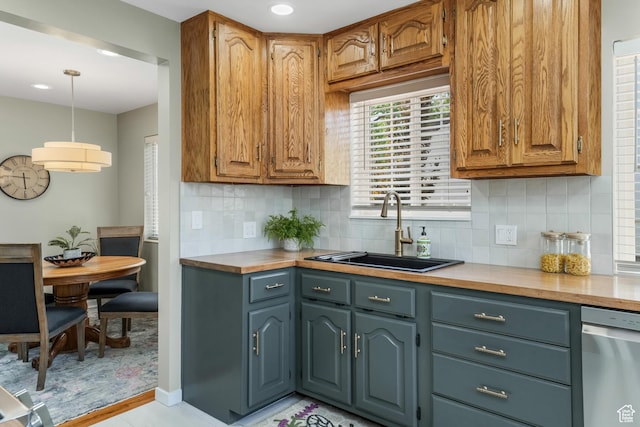 2612 S 1900 E, Salt Lake City, UT 84106 - kitchen with light countertops, dishwasher, decorative backsplash, and recessed lighting