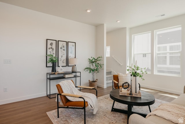 247 E 1850 N Unit 1, North Ogden, UT 84414 - sitting room featuring stairs, plenty of natural light, wood finished floors, and recessed lighting
