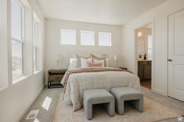 247 E 1850 N Unit 1, North Ogden, UT 84414 - bedroom with light colored carpet and connected bathroom